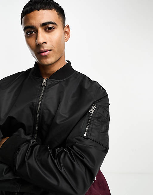 Levi's nylon varsity jacket in black | ASOS