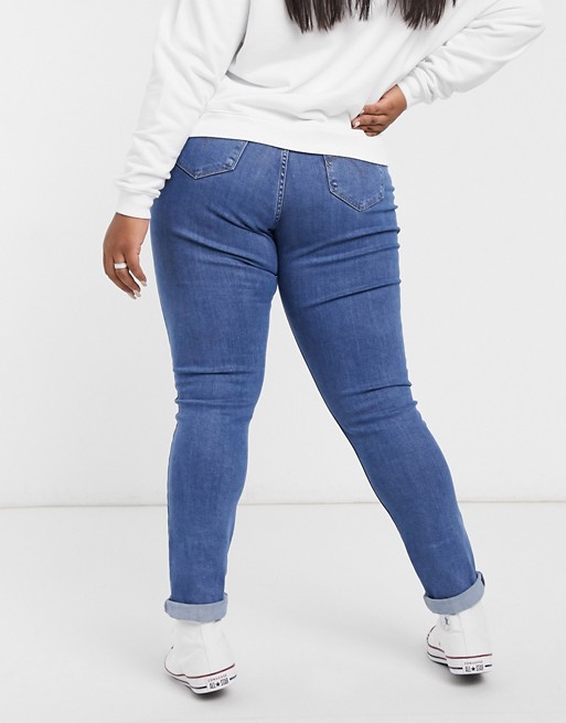 Levi S Plus 311 Shaping Skinny Jeans In Mid Wash Asos