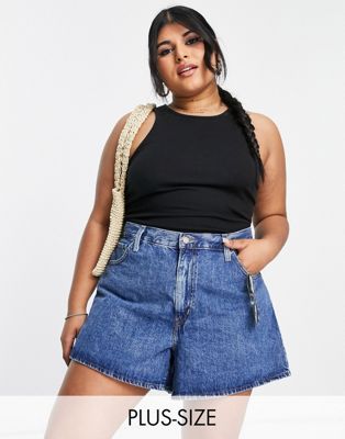 Levi's Plus high waisted shorts in mid wash