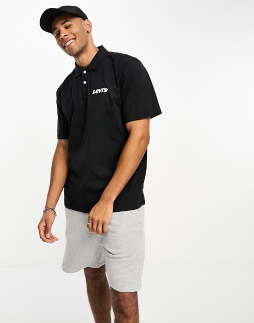 Levi's - Poloshirt van jersey met vintage pasvorm en klein logo in zwart