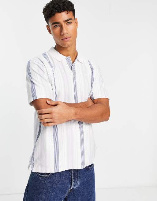 Levi's - Pool Side - Gestreept poloshirt met klein logo in blauw en wit