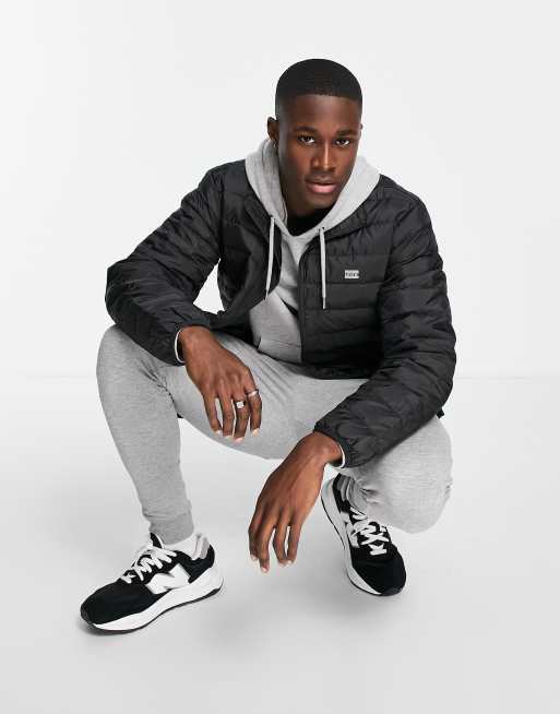 Levi's presidio packable puffer jacket in black, 4 of 4