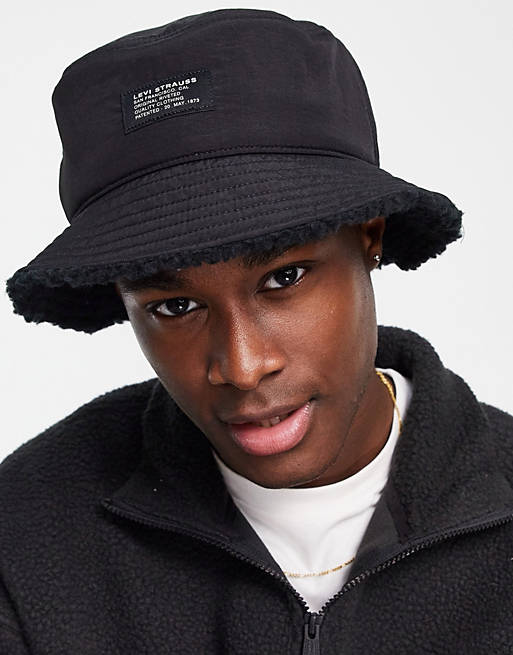 Levi's reversible bucket hat in black with poler fleece lining | ASOS