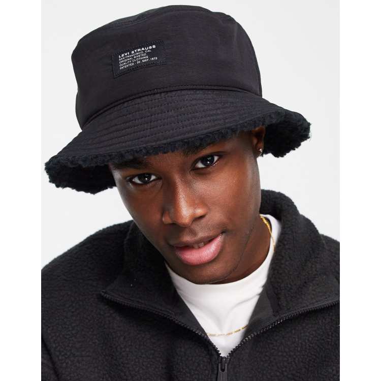 Levi's reversible bucket hat in black with poler fleece lining | ASOS