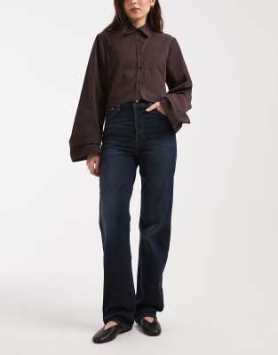 Levi's - Ribcage Bells - Ausgestellte Jeans in dunkelblauer Waschung mit hohem Bund