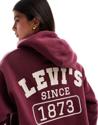 Levi's - Salinas - Kapuzenpullover in Burgunderrot mit lockerem Schnitt und Football-Logo im College-Stil auf der Rückse...