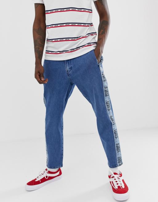 Levis logo hot sale stripe jeans