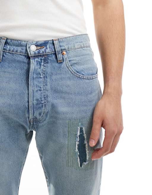 Levi's Skate 501 jeans in light blue with knee rip | ASOS