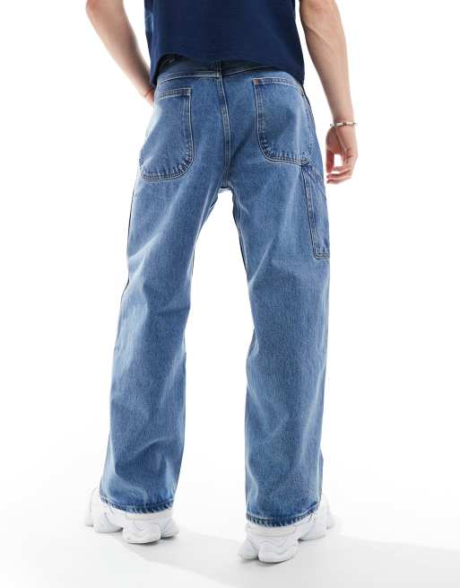 Levi's Skate crop carpenter fit jeans in blue with patchwork | ASOS