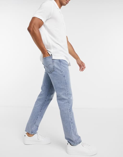 Levi's Skateboarding 501 jeans with rips in mid blue | ASOS