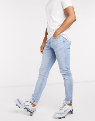 Levi's - Skinny jeans met smaltoelopende pasvorm en gebleekte wassing | ASOS