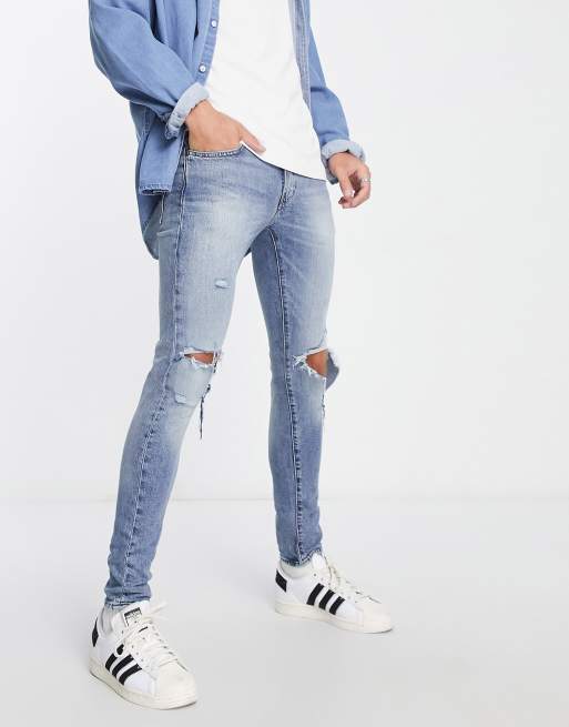 skinny taper fit jeans with in light blue | ASOS