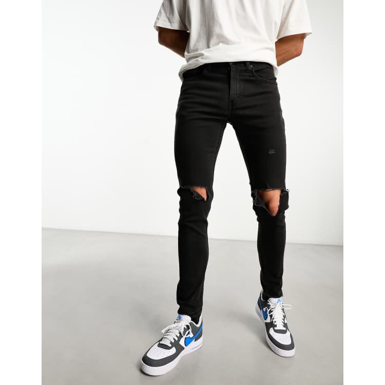 Mens black ripped tapered hot sale jeans