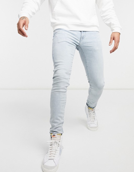 Levi's skinny tapered fit jeans in eat the popcorn advanced light wash