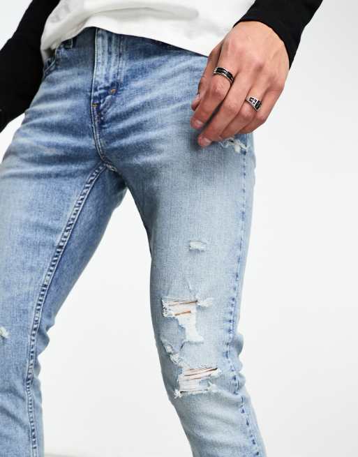 Mens slim best sale fit jeans distressed