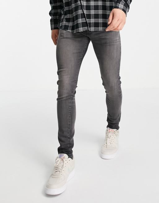 Levi's skinny tapered fit jeans in washed black | ASOS