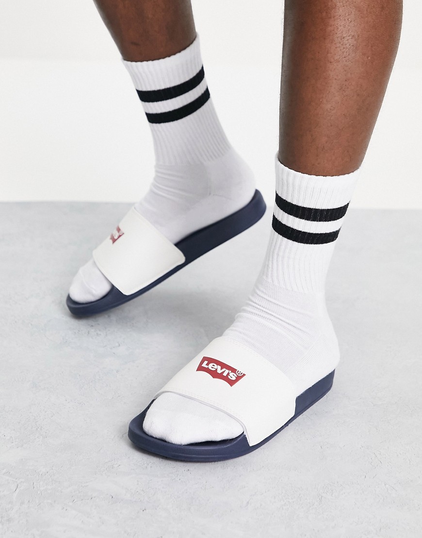 levi's slider in white with batwing logo