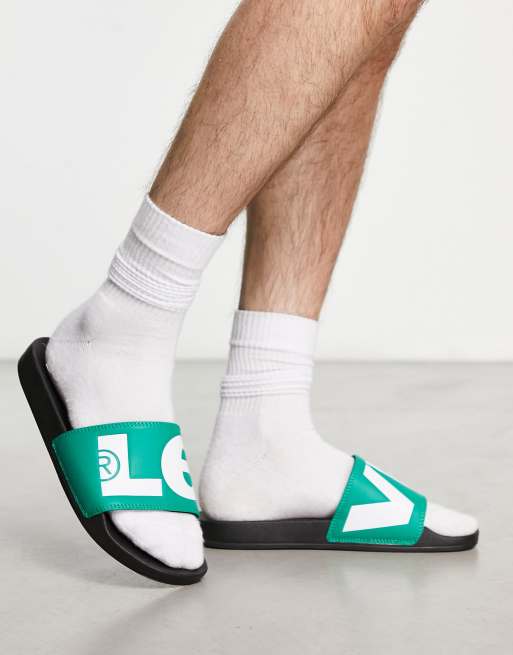 Levi's sliders in green with large logo