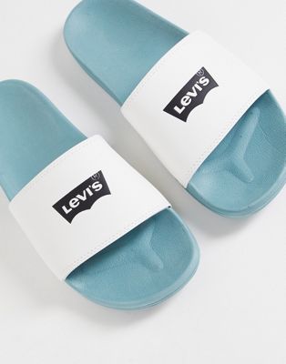 Levi's sliders with batwing logo in green