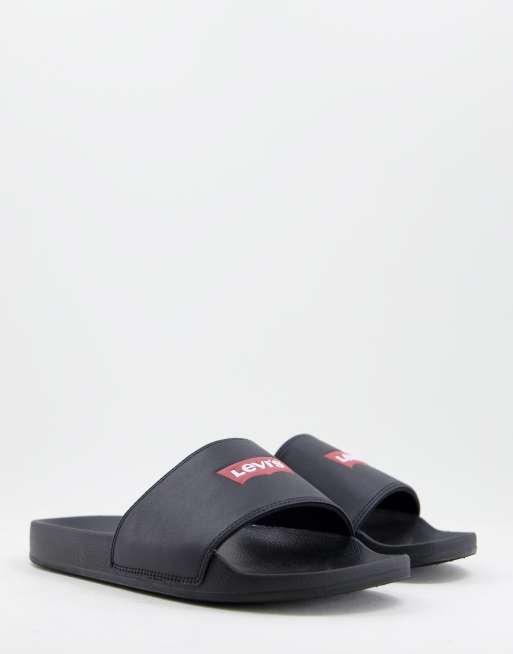 Levi's slides in black with batwing logo