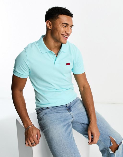 Levi's slim fit polo shirt in green and small batwing logo | ASOS