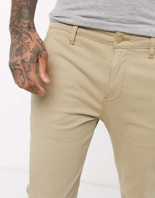 Levi s slim tapered fit chinos in true chino beige shady wash