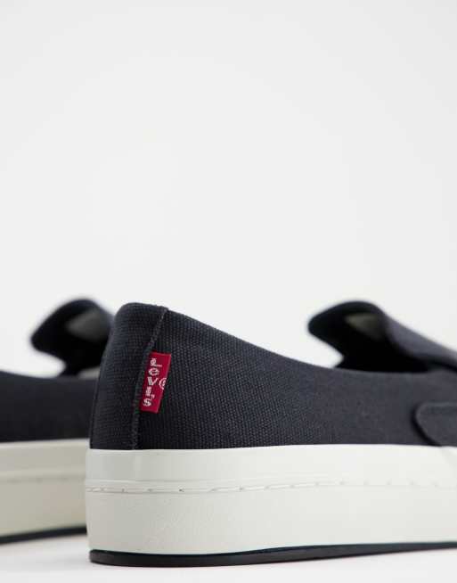 Levi's slip on low canvas shoe in black | ASOS