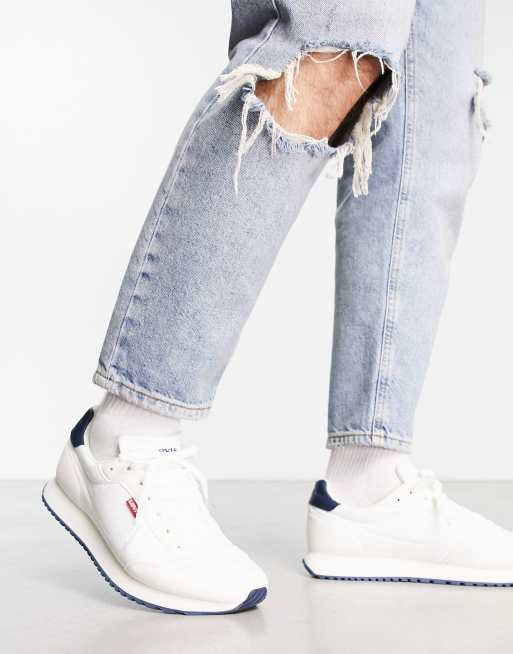 Levi's - Stag - Hardloopschoenen in wit met rood label-logo