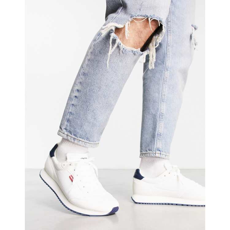 Levi s stag runner trainer in white with red tab logo ASOS