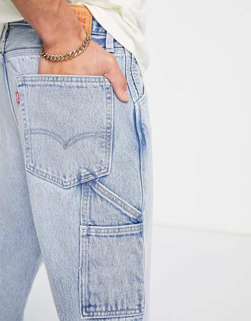 Levi's stay loose carpenter jeans in light blue wash | ASOS