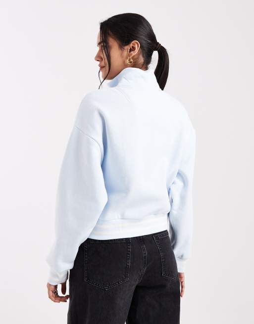 Levi's - Sudadera con cuello de cremallera corta en azul claro, 2 de 4