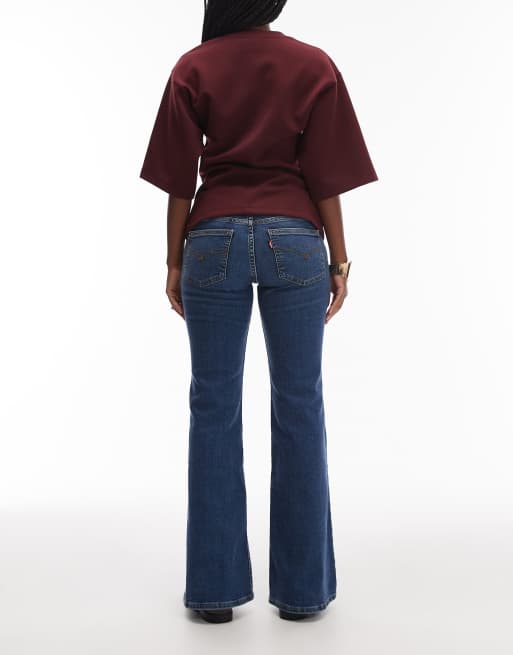 Levi's superlow bootcut jeans in dark blue , 3 of 5
