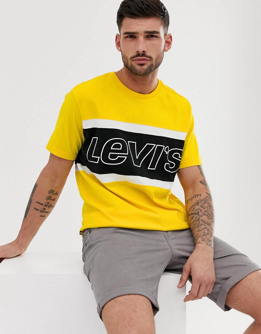 Levi's - T-shirt color block giallo acceso con logo sul petto