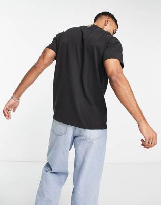 T-shirt nera con etichetta piccola del logo al centro-Nero - Levi's T-shirt donna  - immagine3