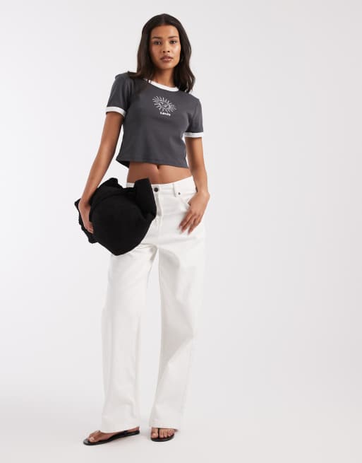 Levi's - T-shirt nera con grafica di sole e bordi a contrasto, 3 di 4