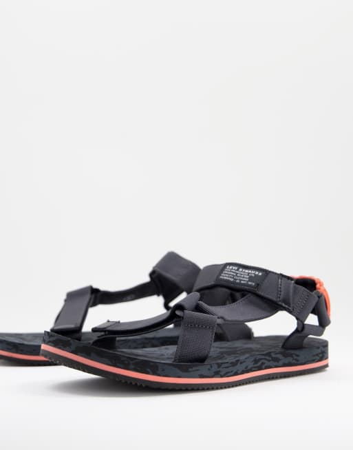 Levi's Tahoe sandals in black with orange back detail