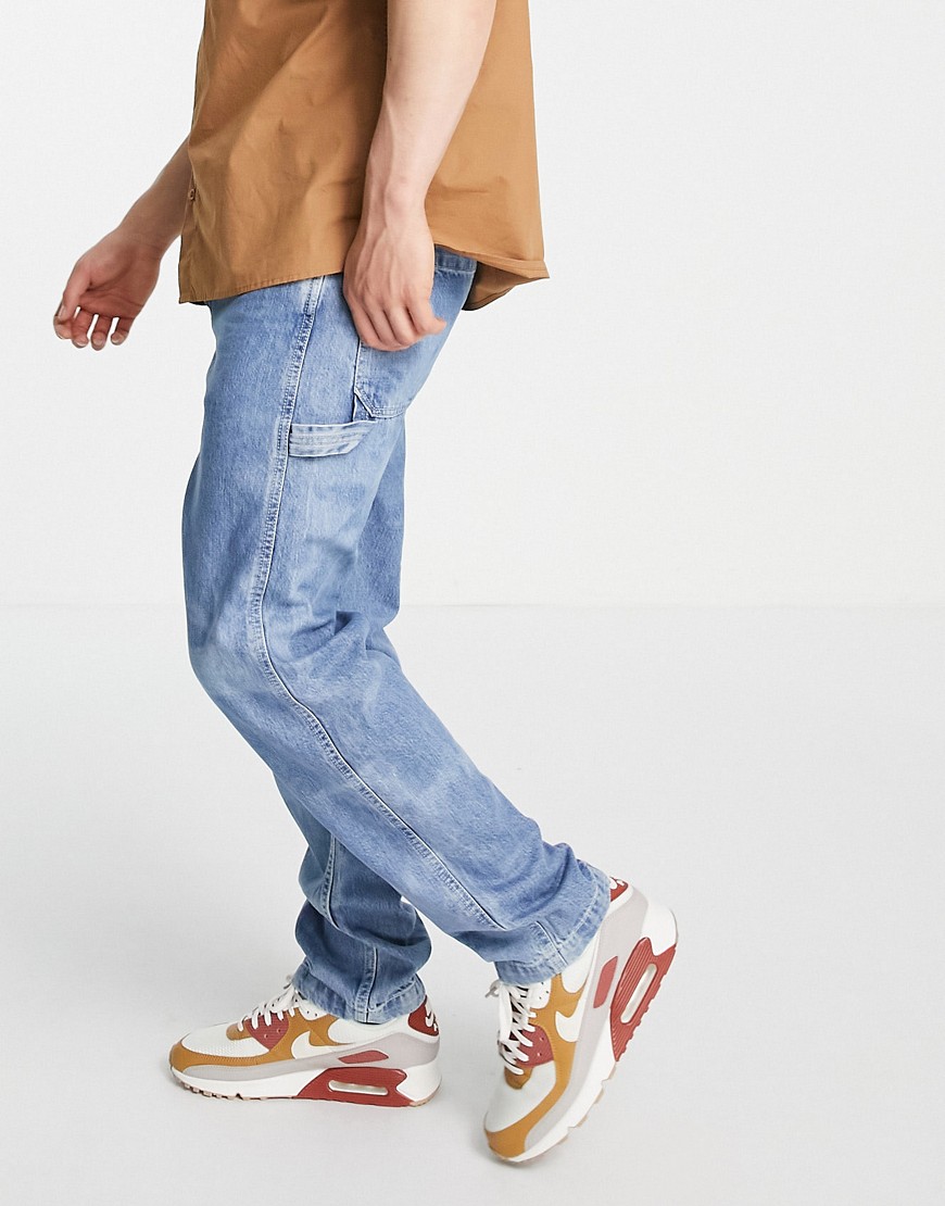 Levi's tapered fit carpenter jeans in mid wash blue-Blues