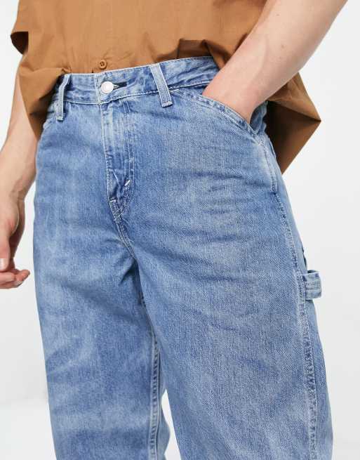 Levi's tapered fit carpenter jeans in mid wash blue