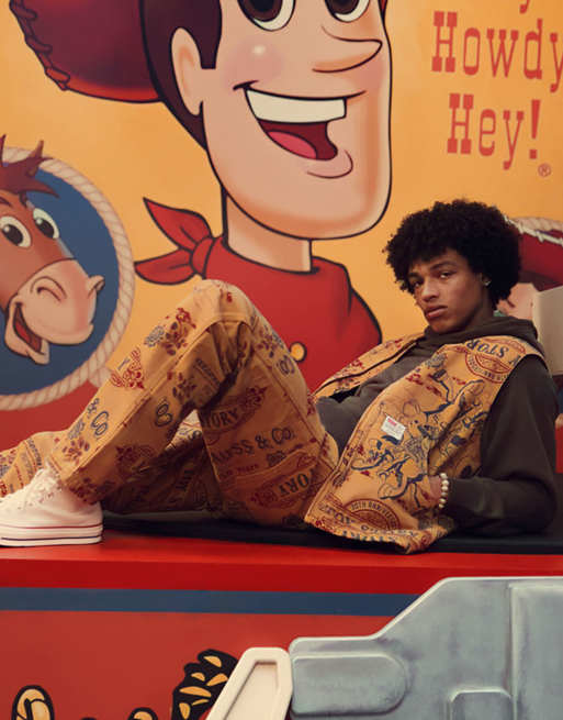 Levi's Toy Story Carpenter Jeans with all over print in tan co-ord