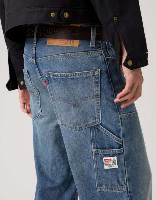 パンツ LEVI'S x Toy Story Western Flare Indigo Levi's Toy Story Loose western flare jeans in mid indigo | ASOS