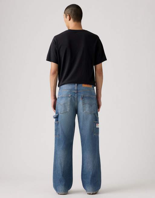 Levi's Toy Story Loose western flare jeans in mid indigo | ASOS