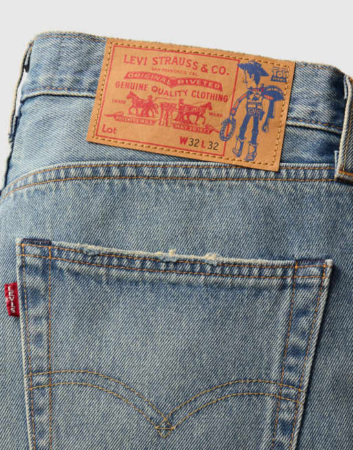 Levi's Toy Story unisex loose straight jeans with patchwork detail in mid wash blue, 5 of 5