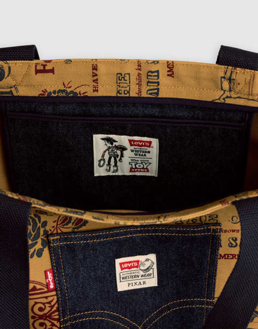 Levi's Toy Story unisex tote bag with all over print in tan | ASOS