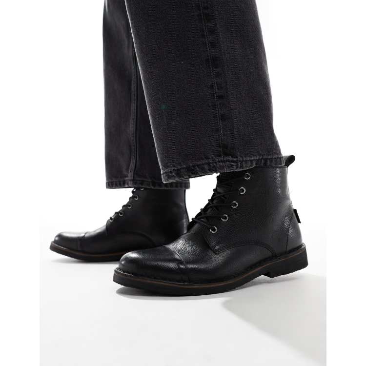 Levi s Track lace up leather boots in black