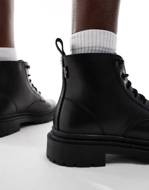 Levi s Trooper leather look lace up boots in black ASOS