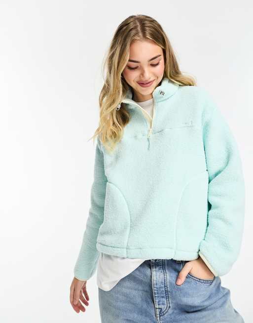 Levi's - Trui van borg met 1/2 rits en klein logo in lichtblauw