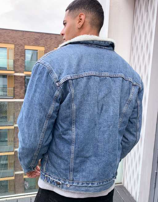 Levi s type 3 sherpa lined denim trucker jacket in fable mid wash