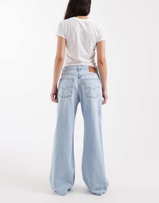 Levi's - vaqueros bootcut holgados de denim azul claro con rotos, 2 de 5
