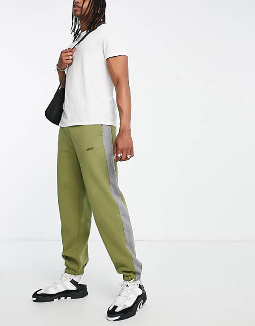 Levi's varsity jogger in olive green with side stripe | ASOS