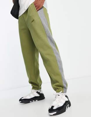 Levi's varsity jogger in olive green with side stripe